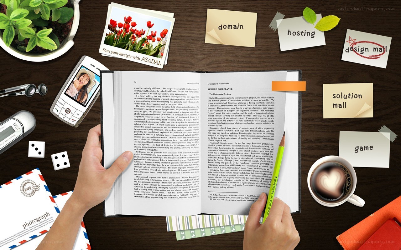 person reading book at desk