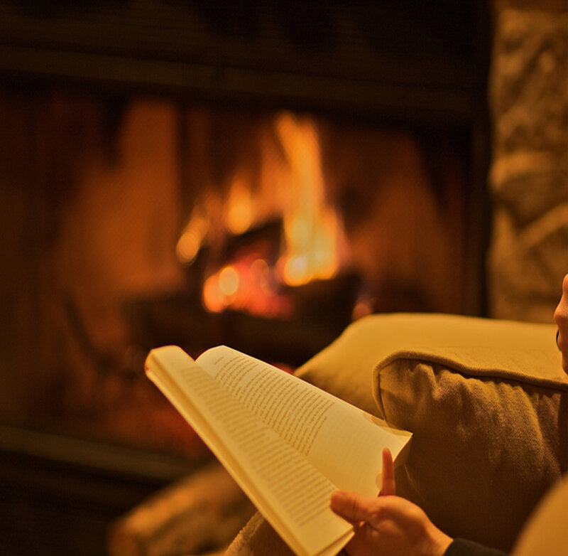 Person Reading Book — Orange