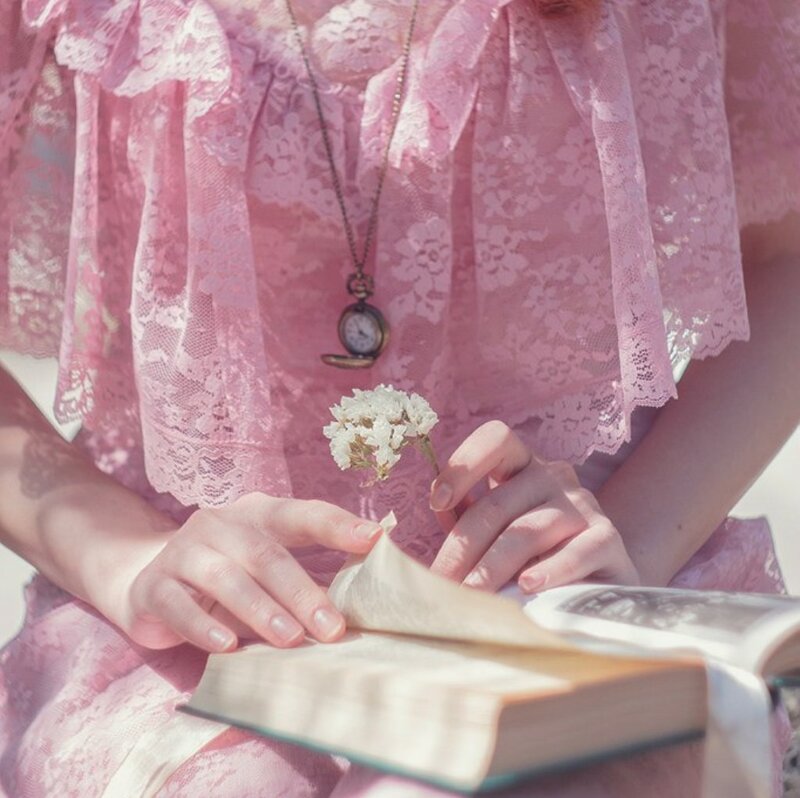 Person Reading Book — Pink