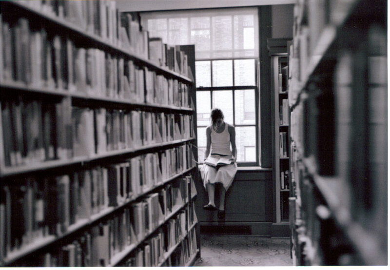 Person reading in a library