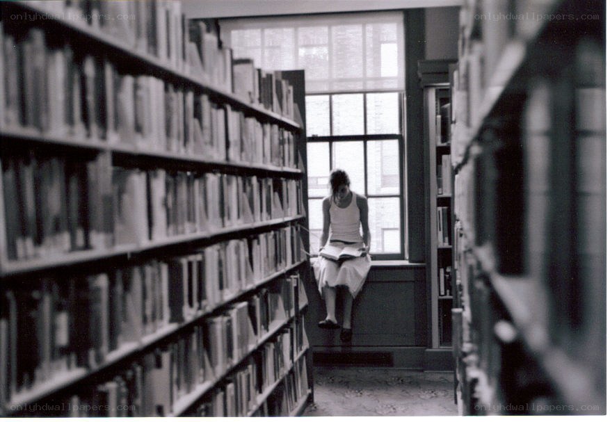 Person reading in a library