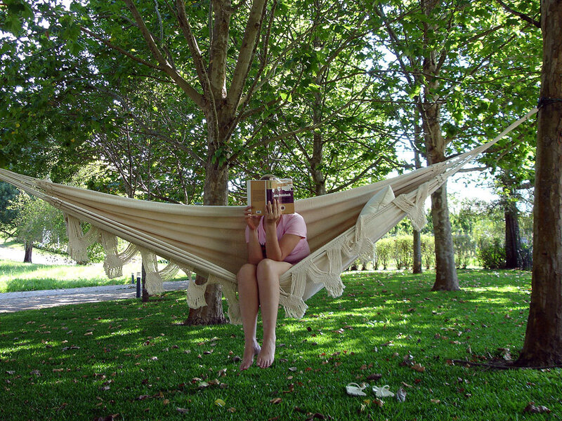 Person Reading in Hammock — Green