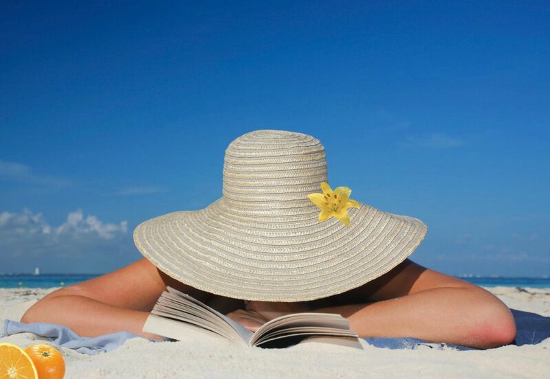 Person Reading on Beach — Blue