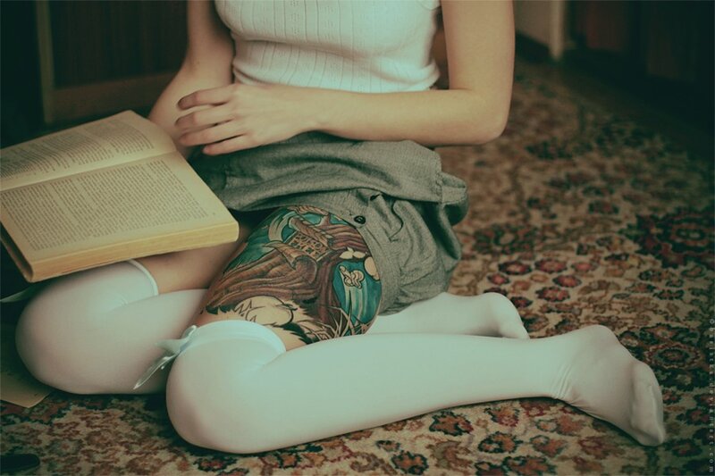 person reading on carpet