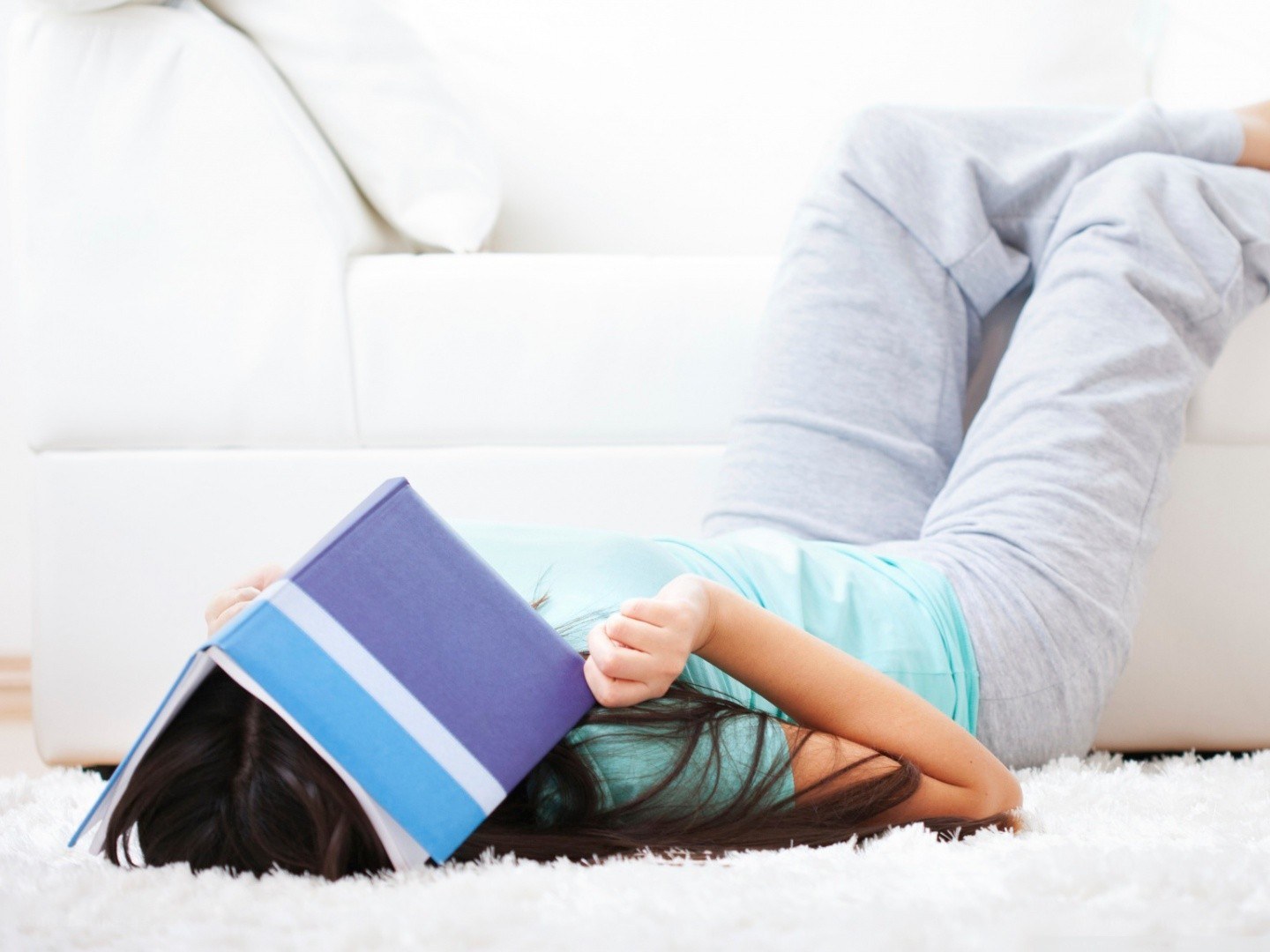 person reading on floor