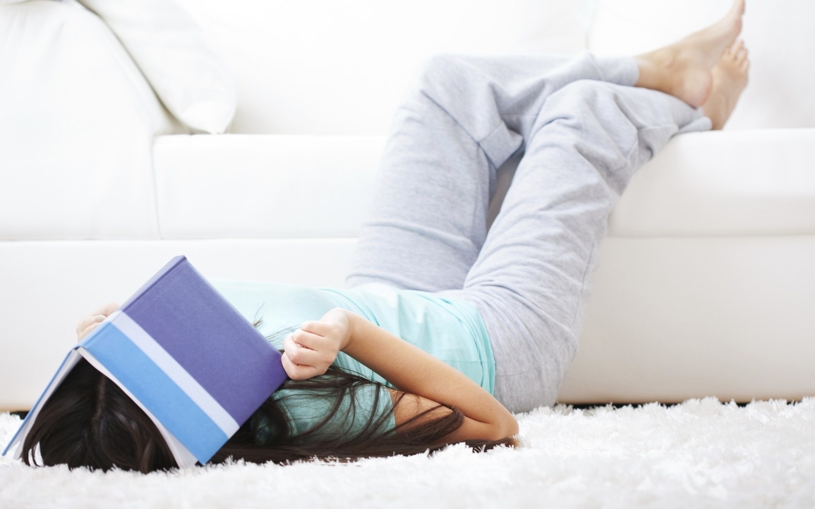 person reading on floor
