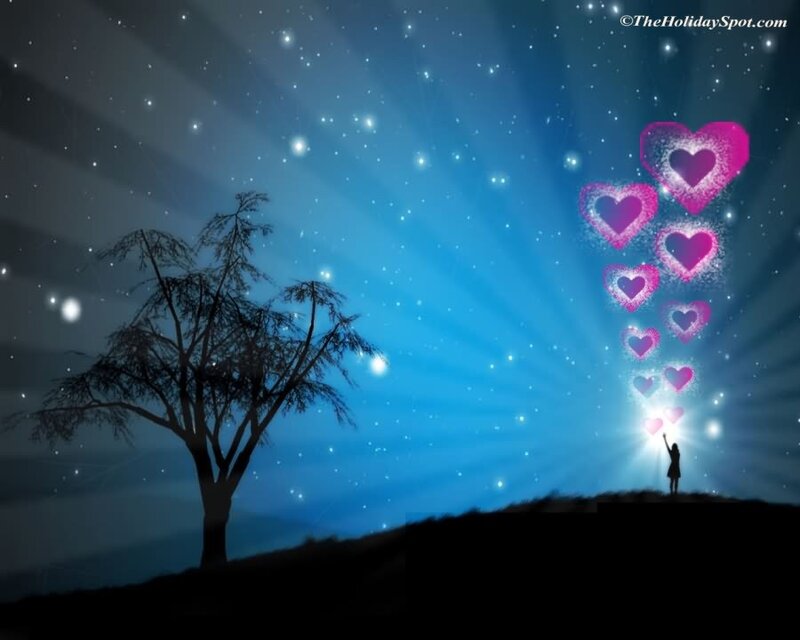 person releasing hearts into the night sky