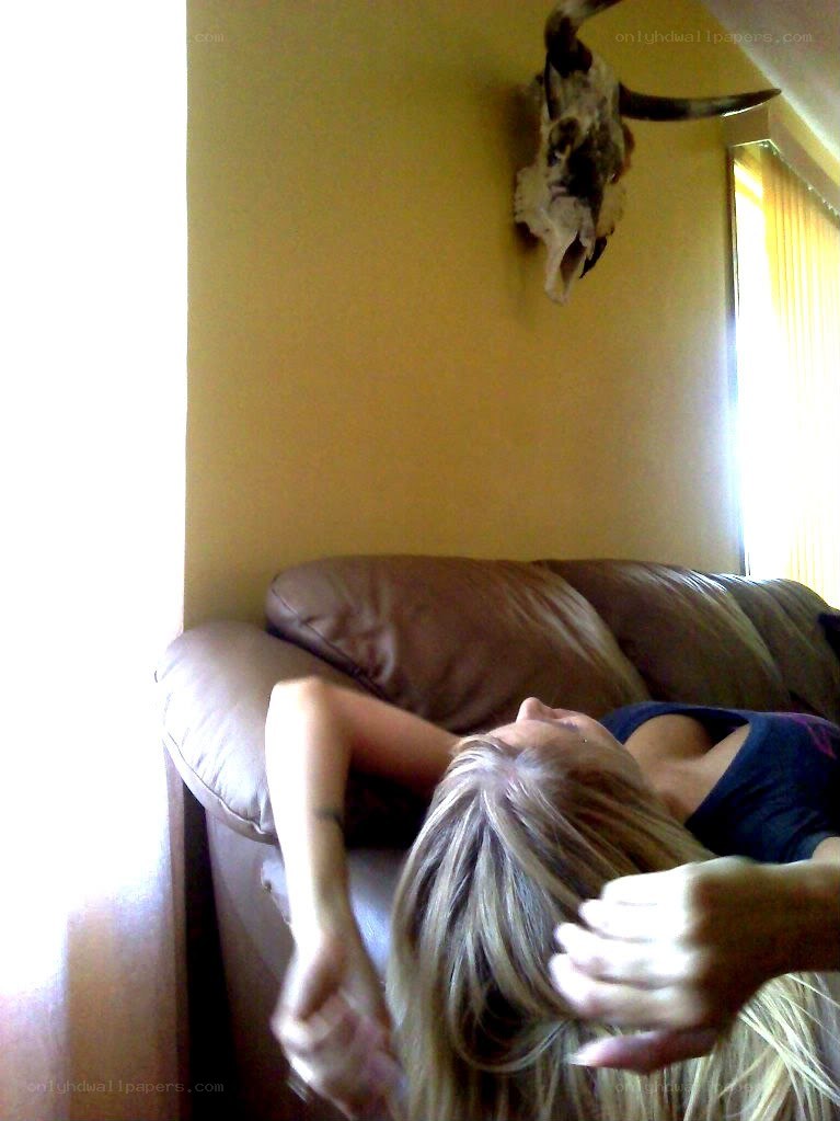 person resting on couch