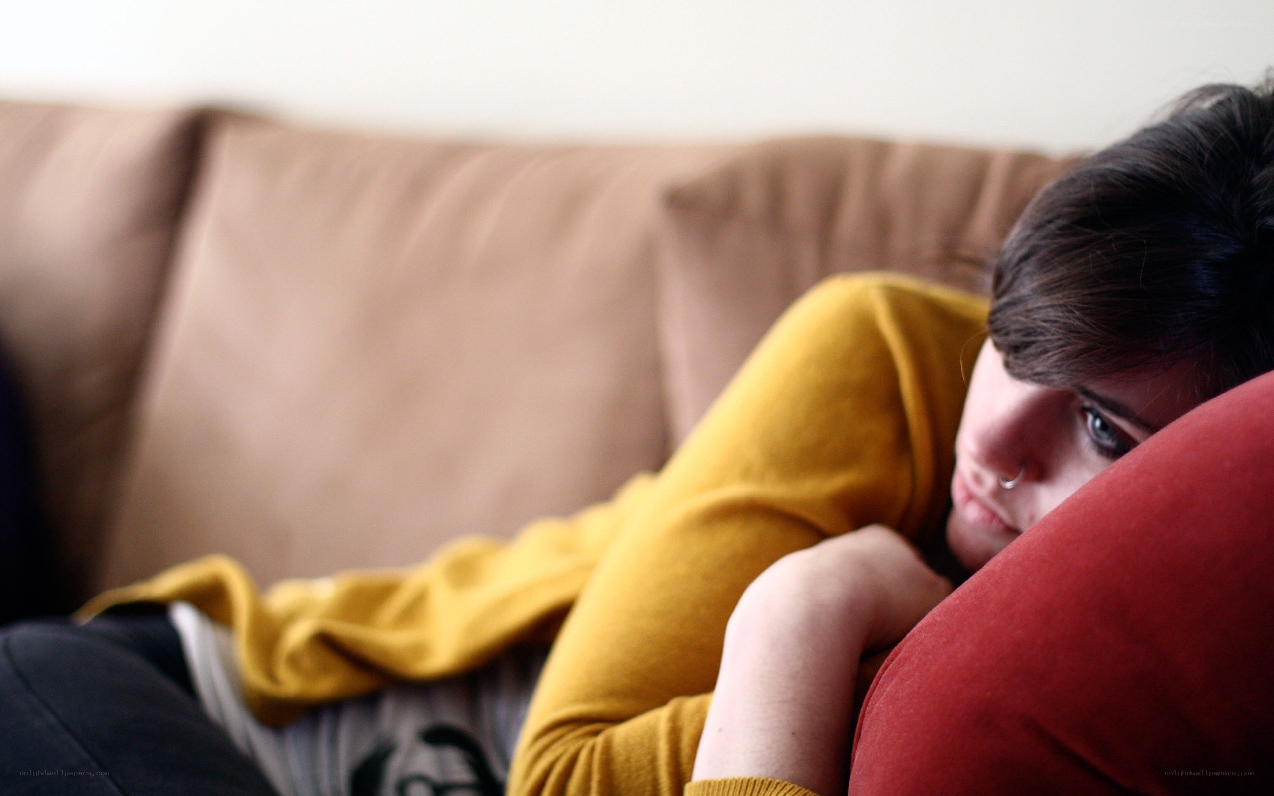 person resting on couch