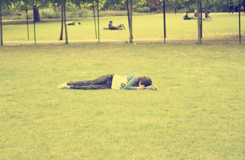 Person resting on grass
