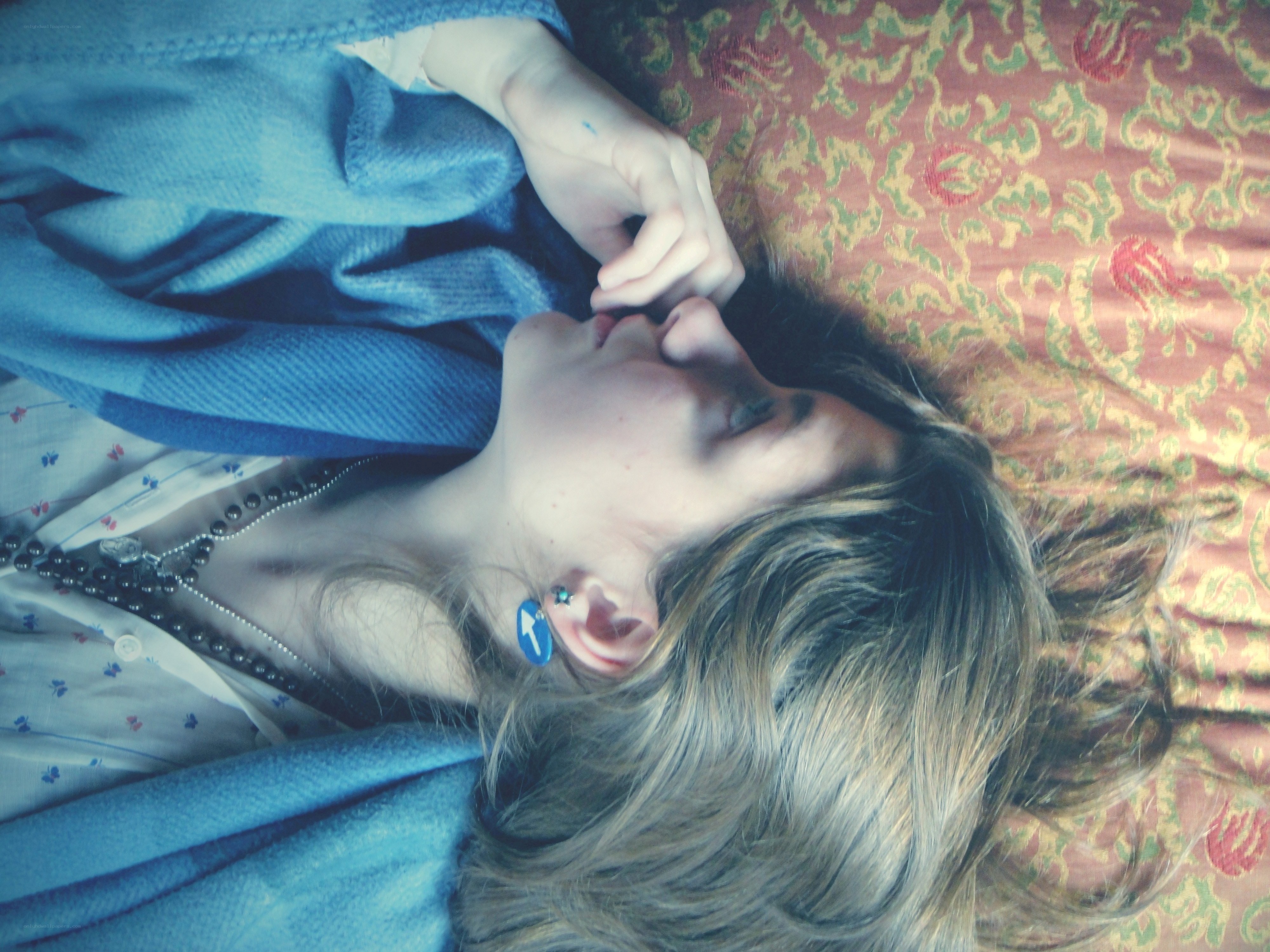 person resting on patterned surface