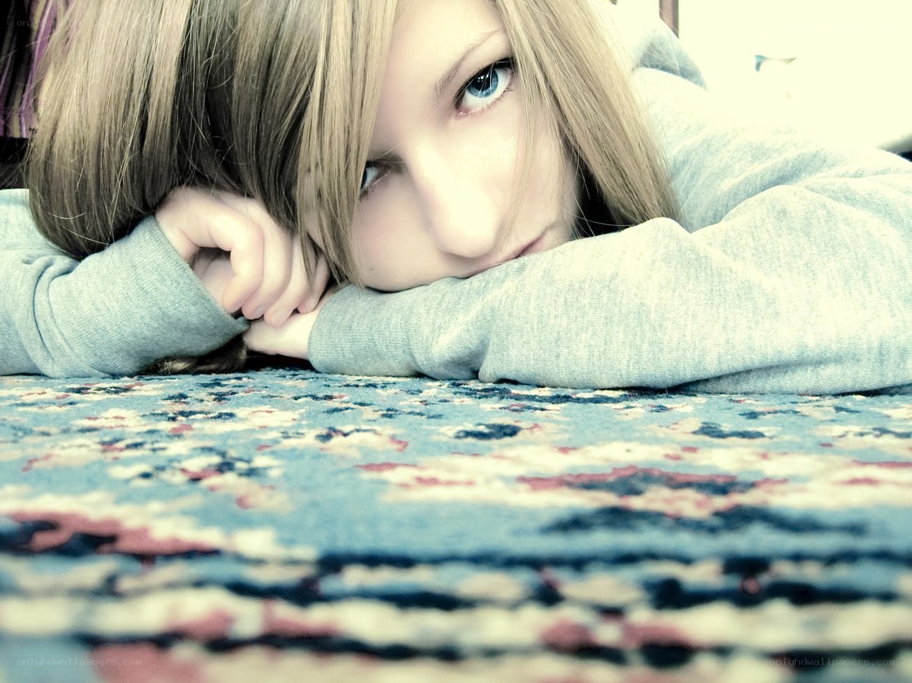 person resting on patterned surface