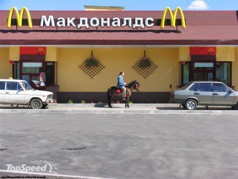 Person Riding a Horse — Yellow