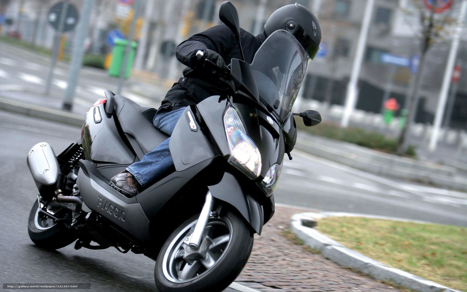 person riding a scooter