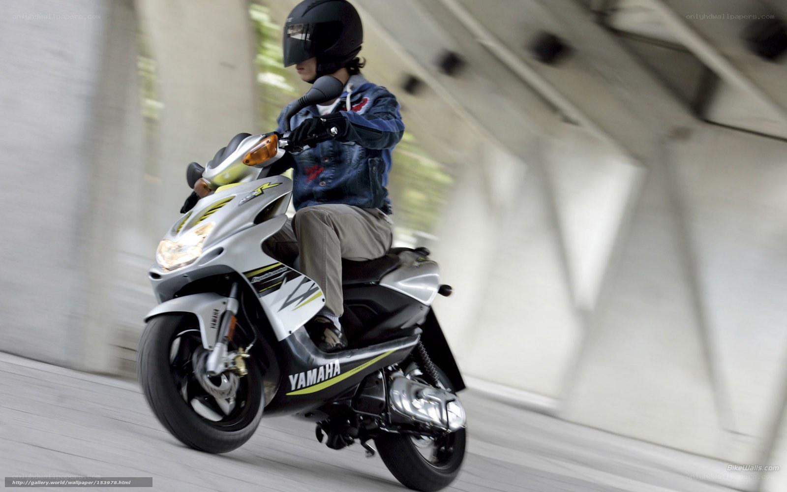 person riding a scooter