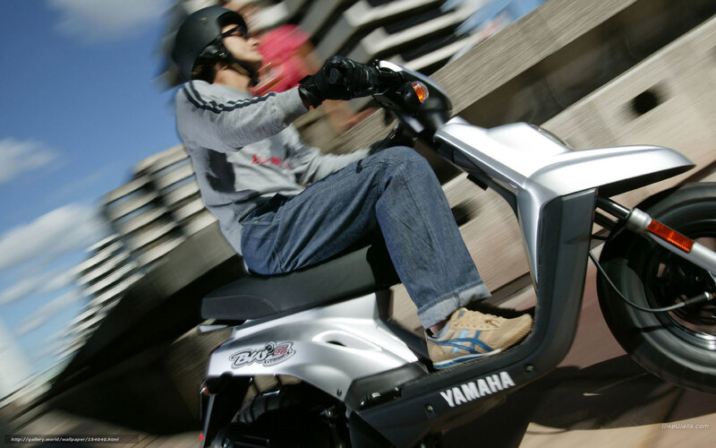 person riding a scooter
