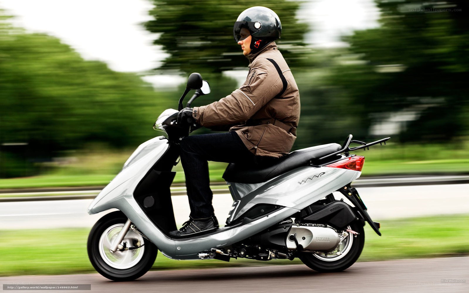 person riding a scooter
