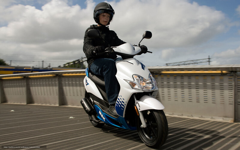 person riding a scooter