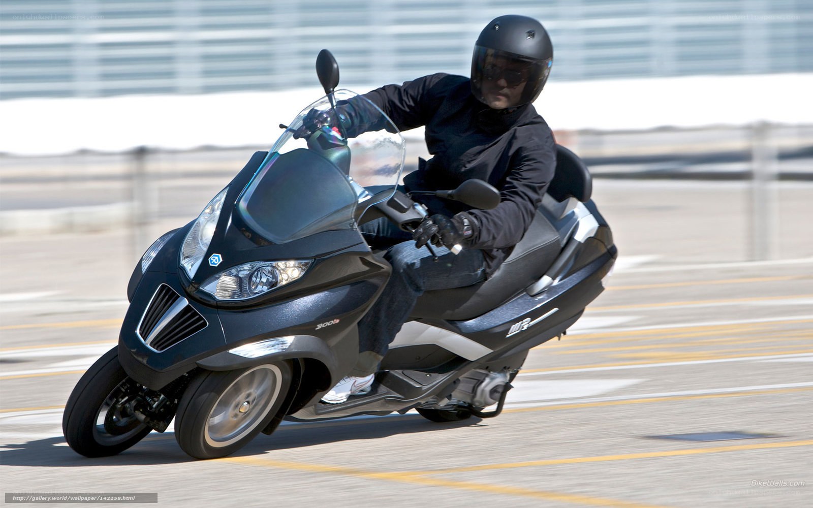 person riding a scooter
