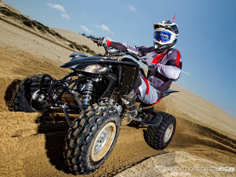Person Riding ATV — Brown