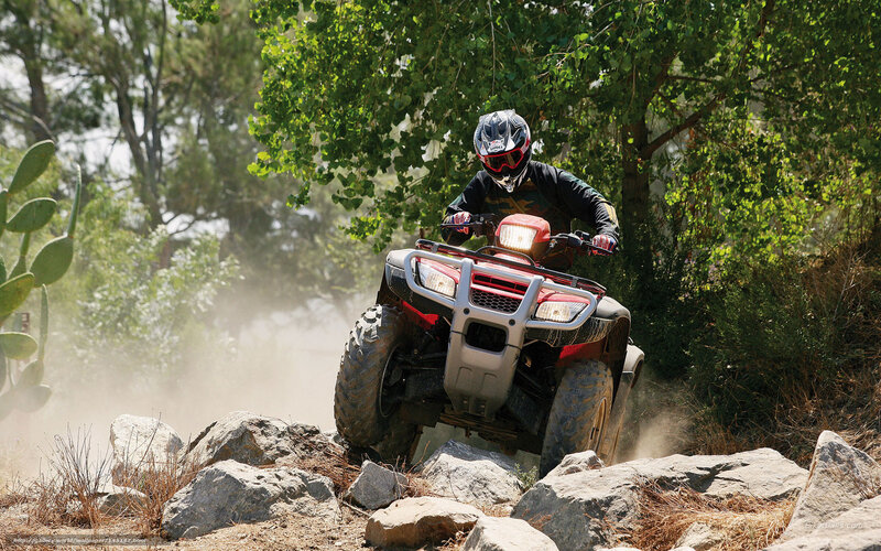 Person Riding ATV — Green