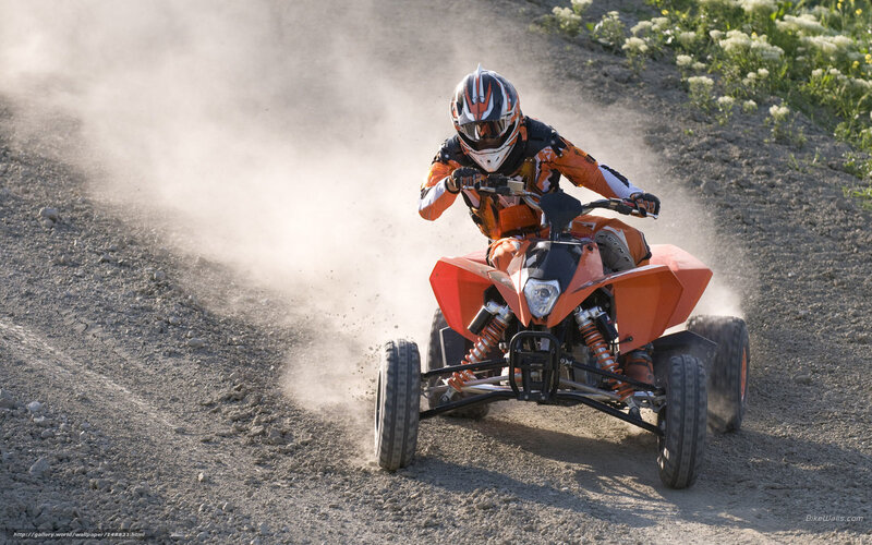 Person Riding ATV — Orange