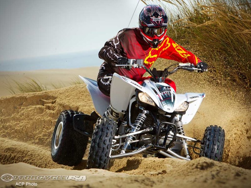 Person Riding ATV — White