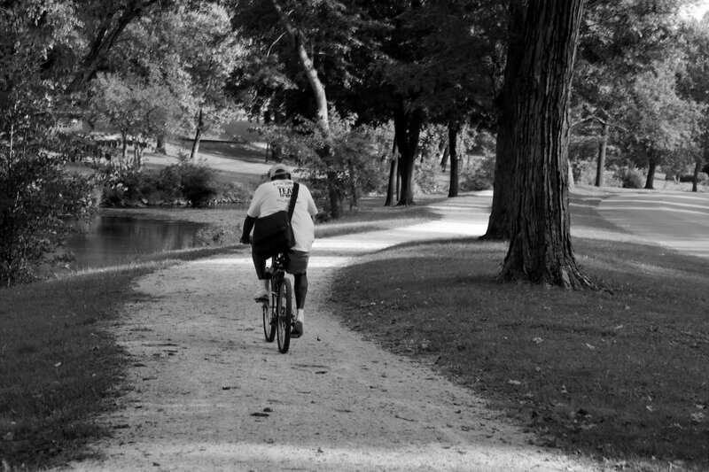 Person Riding Bicycle — Black