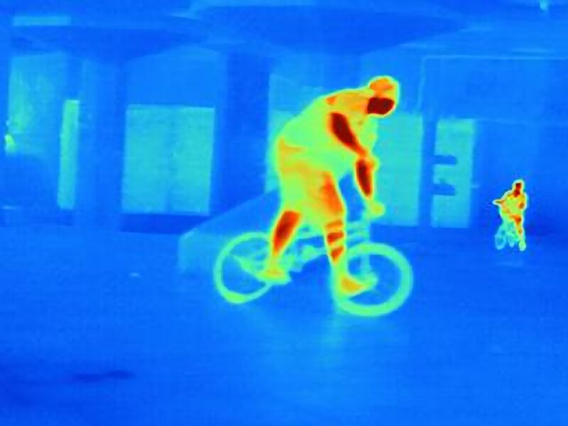 Person Riding Bicycle — Blue