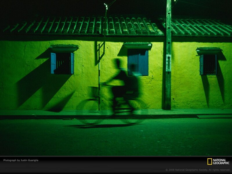 Person Riding Bicycle — Green