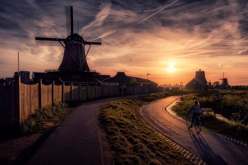 Person Riding Bicycle — Orange, Dramatic