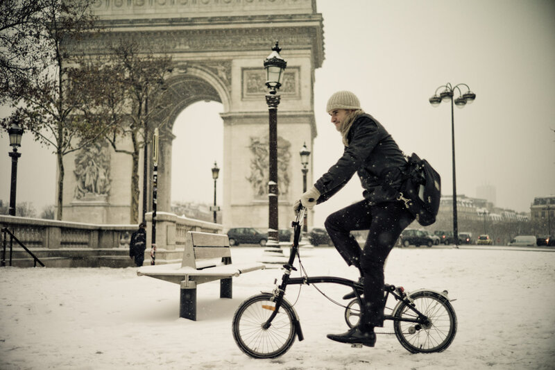Person riding bike in snow