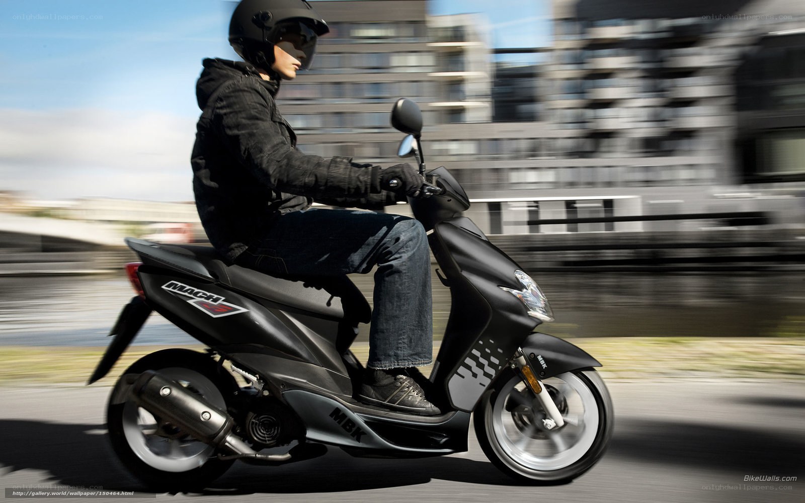person riding black scooter