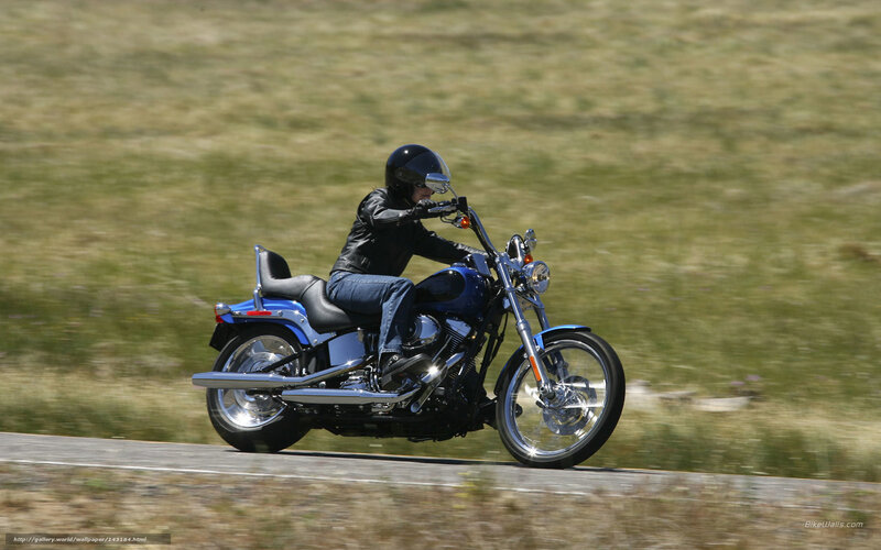 Person Riding Blue Motorcycle — Active
