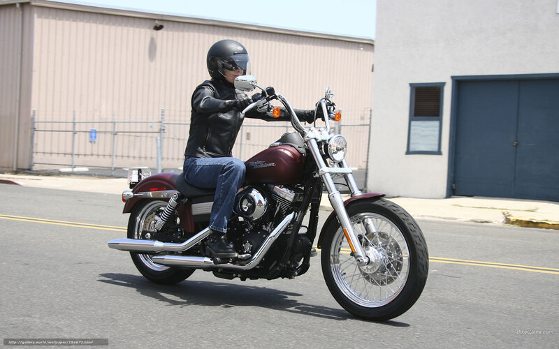 Person Riding Motorcycle — Maroon