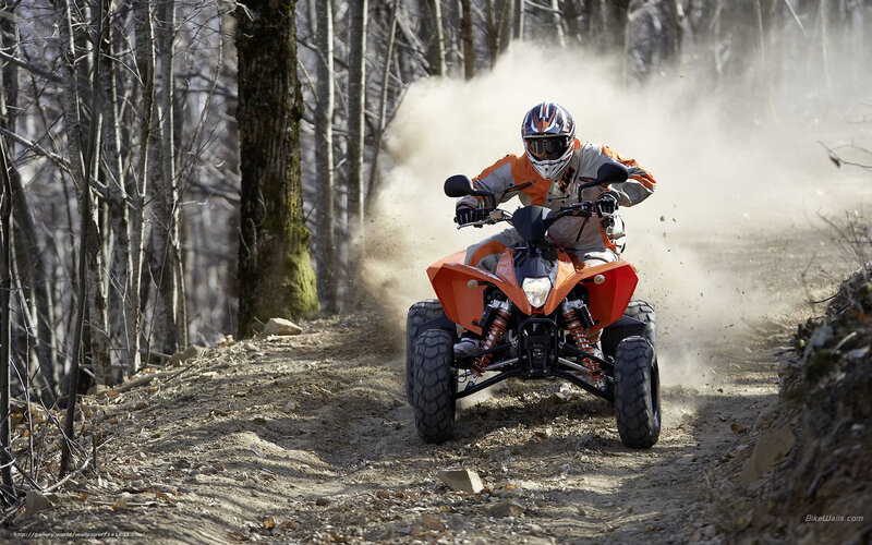 Person Riding Quad Bike — Orange, Dynamic