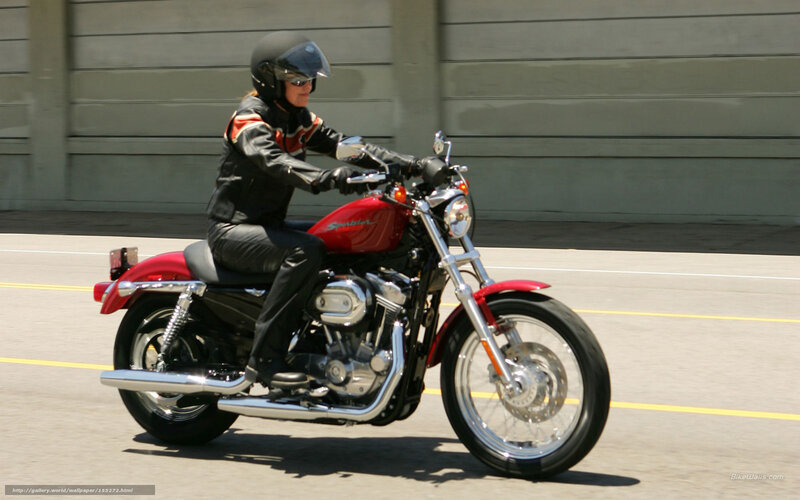 Person Riding Red Motorcycle — Active