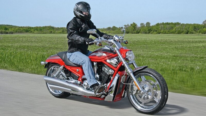 Person Riding Red Motorcycle — Calm