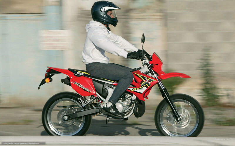 Person Riding Red Motorcycle — Dynamic, Afternoon, Photograph