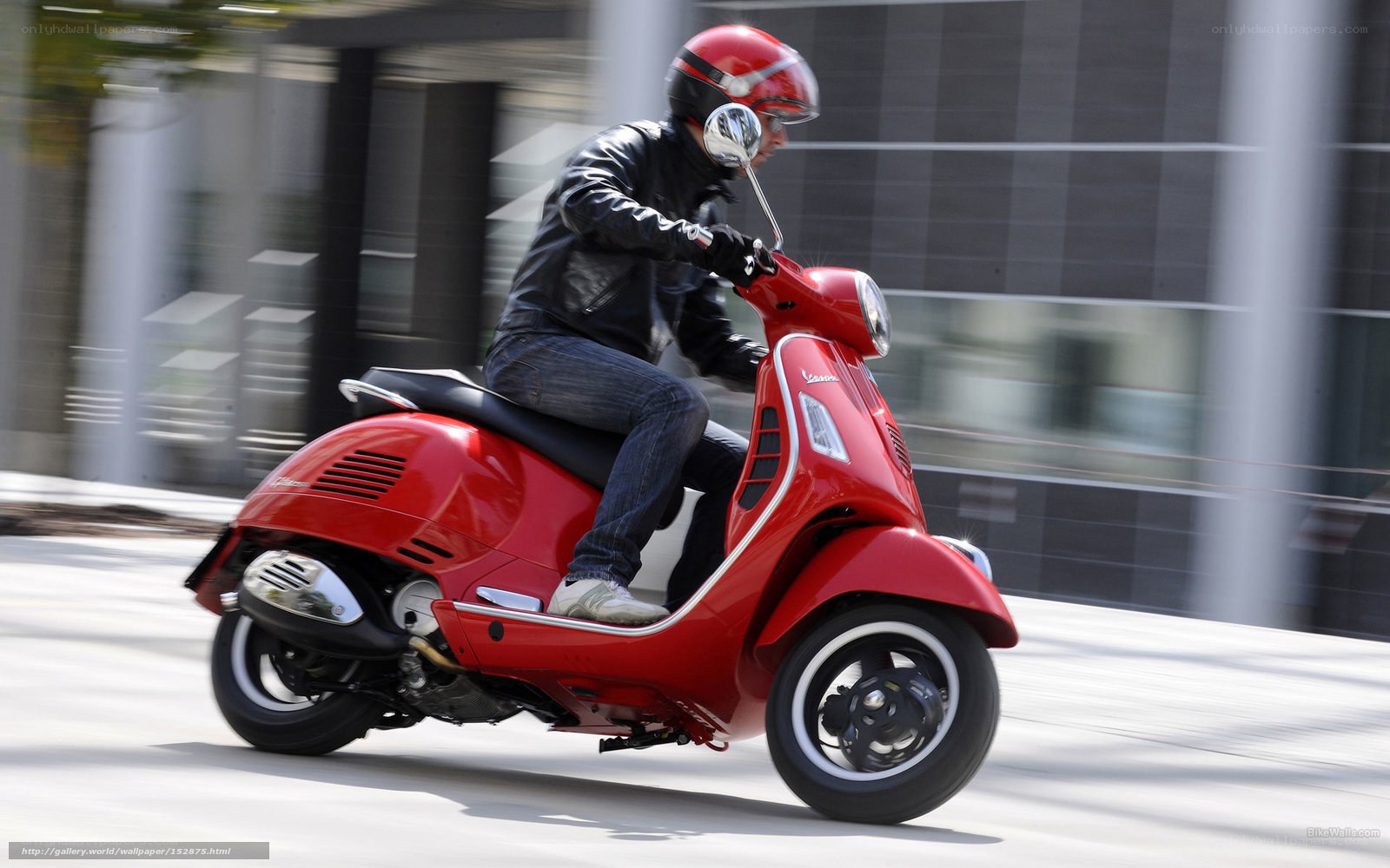 Person riding red scooter
