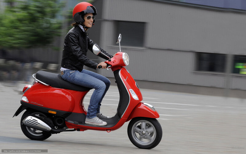 Person Riding Red Scooter — Active
