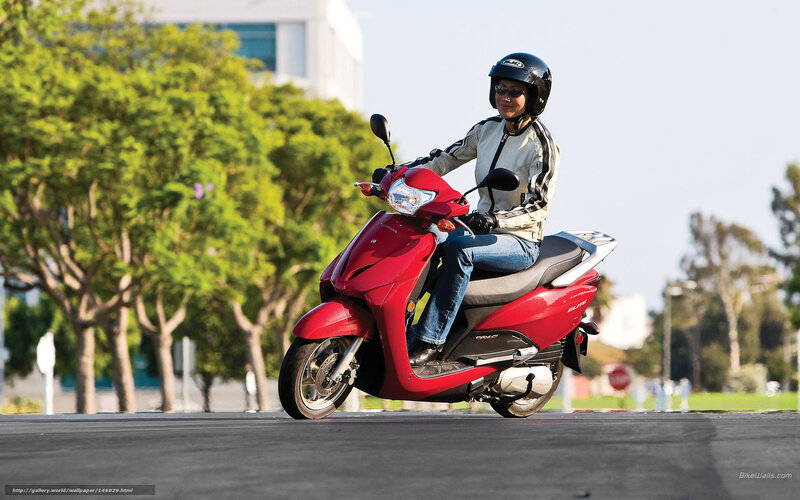 Person Riding Red Scooter — Calm