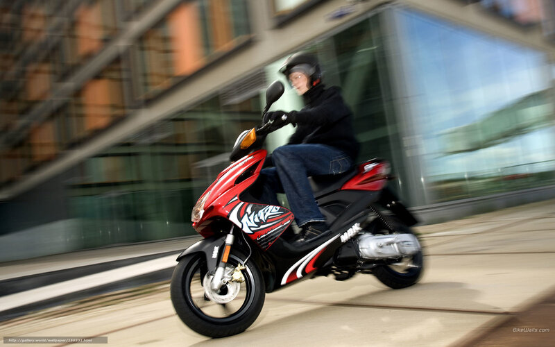 Person Riding Red Scooter — Dynamic, Afternoon, Photograph, Helmet, Building