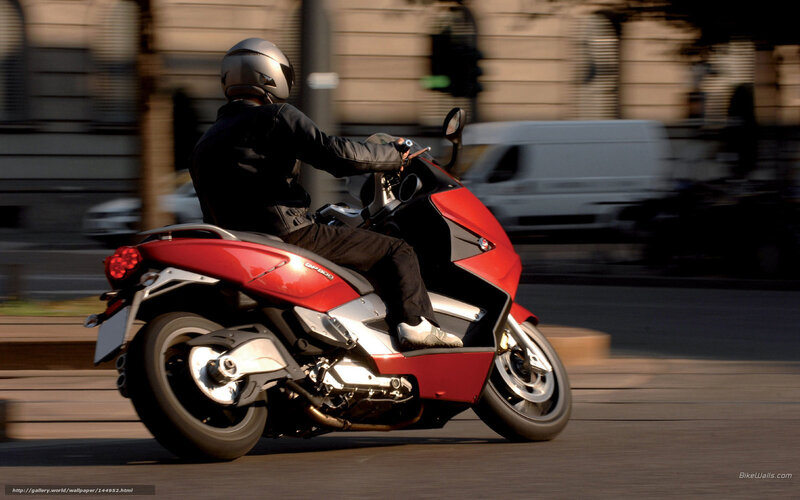 Person Riding Red Scooter — Dynamic, Afternoon