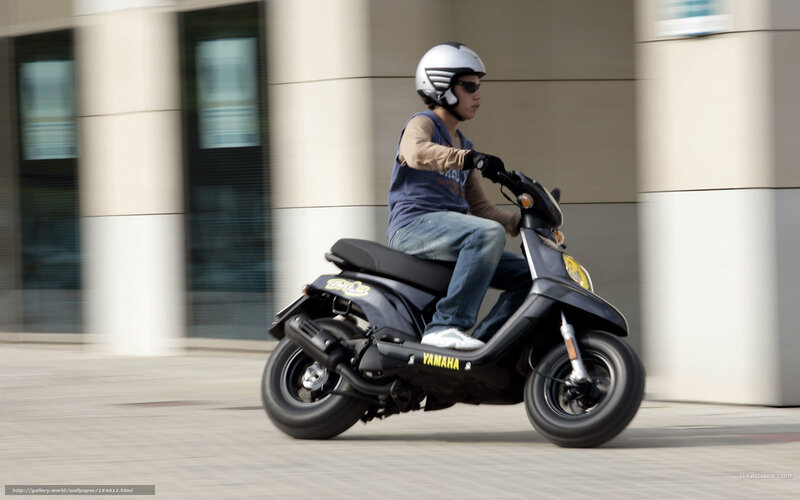 Person Riding Scooter — Black, Dynamic, Afternoon, Photograph, Helmet, Building