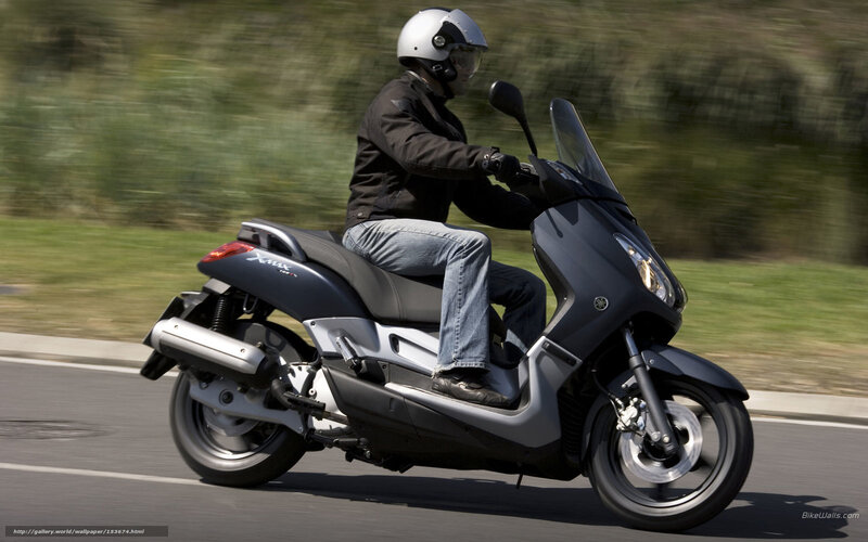 Person Riding Scooter — Black, Dynamic, Afternoon, Photograph, Helmet, Road, Grass