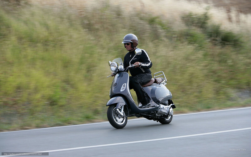 Person Riding Scooter — Gray