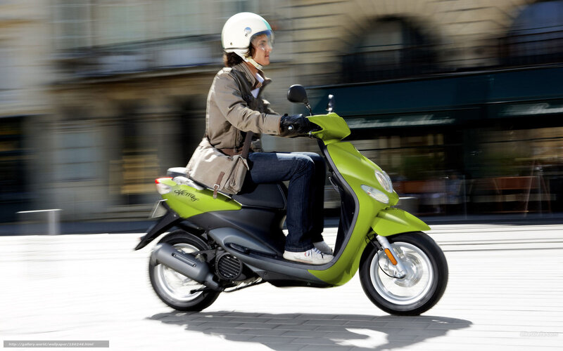 Person Riding Scooter — Green