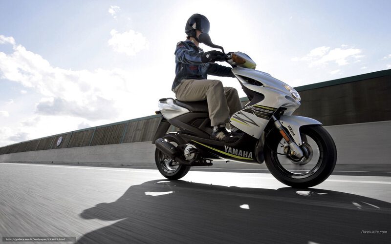 Person Riding Scooter — Silver, Dynamic, Afternoon, Photograph