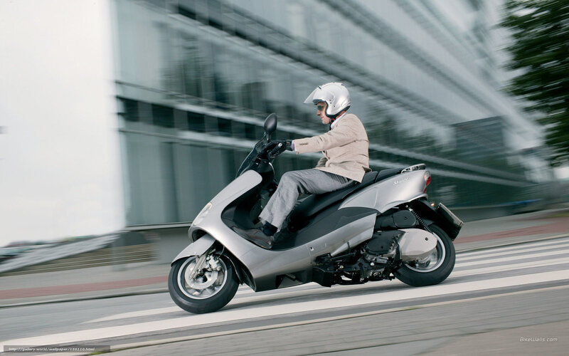Person Riding Scooter — Silver, Dynamic, Afternoon